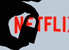 Man holding padlock in front of the Netflix logo